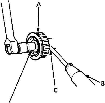 Diagram of front balancer assembly showing timing balance belt driven pulley being held by a screwdriver at the maintenance hole. Figure ID 12M0768.