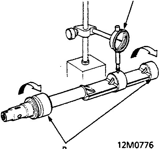 Balancer shaft supported on V-blocks with a dial indicator measuring runout on the No. 2 journal