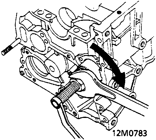 Diagram showing a wrench holding the shaft end and turning a nut on the cylinder block assembly