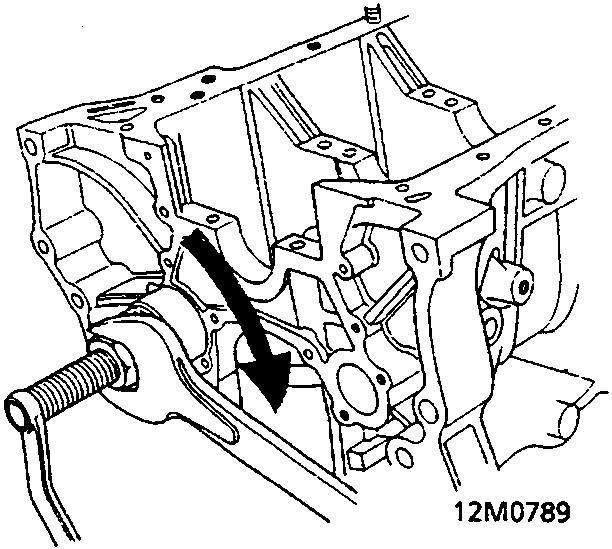 Diagram showing a wrench turning a nut on the shaft to install the bearing into the cylinder block.