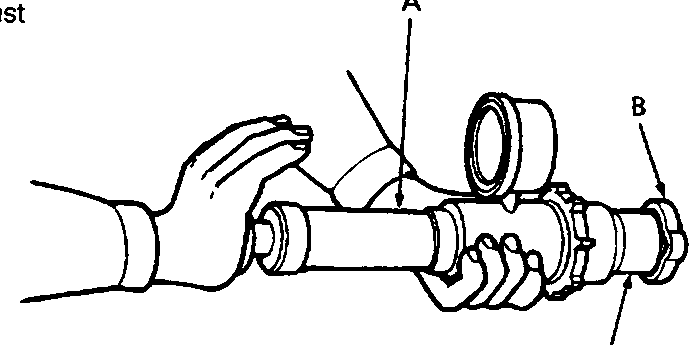Diagram showing hands attaching a radiator pressure tester to a radiator cap using an adapter