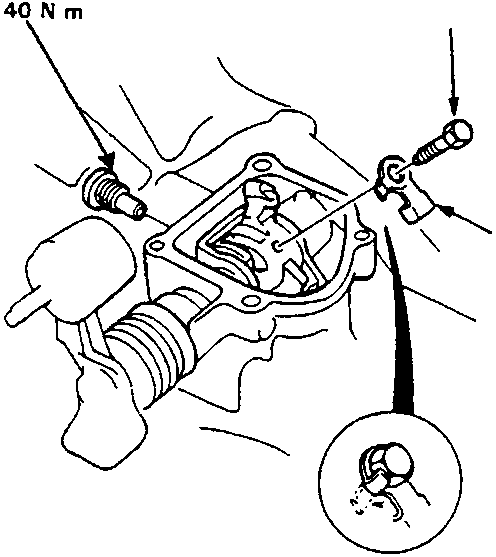 Diagram showing interlock bolt and lock washer being removed from gearbox with torque values 40 N m and 30 N m