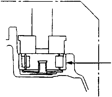 Cross-sectional detail of the installed needle bearing (A) seated within the clutch housing bore.