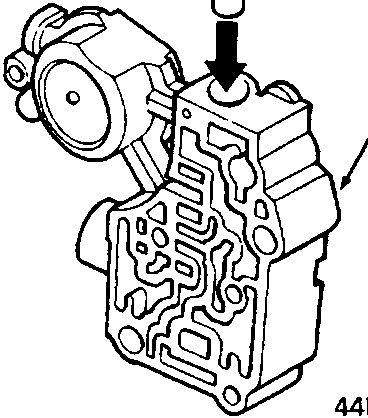 Diagram showing a valve being inserted vertically into a valve body bore