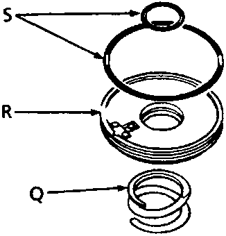Exploded view of clutch components labeled R and Q, with a retaining ring above them