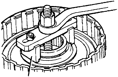 Tool 18G 1016 and 18G 1016-2 (44M 0379) compressing a return spring in a clutch assembly