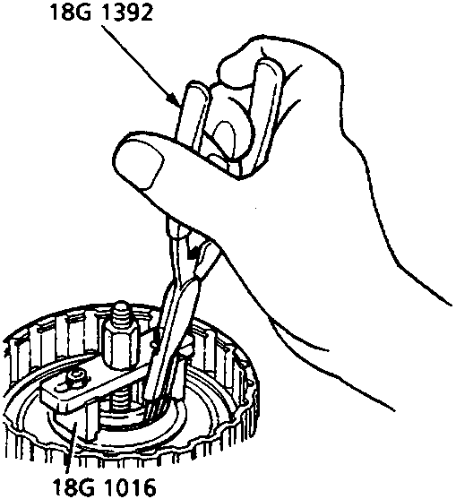 Tool 18G 1392, 18G 1016 and 18G 1016-2 (44M 0380) fitting a snap ring into a clutch assembly