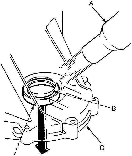 Diagram showing removal of bearing outer race and thrust shim using a heat gun