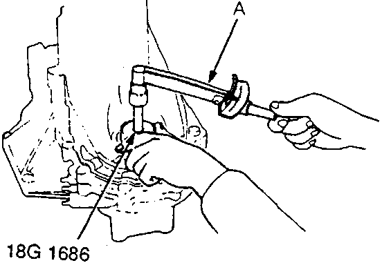 A hand using a torque wrench (A) on the transmission housing.