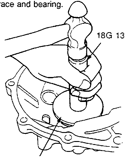 Special tools (18G 1354 and 18G 1354-12) being used to install a bearing outer race into the housing.