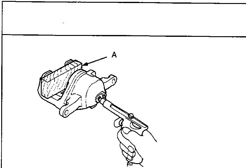 Diagram showing a brake caliper with a wooden block labeled A being used to cushion the piston while compressed air is applied through the fluid inlet.