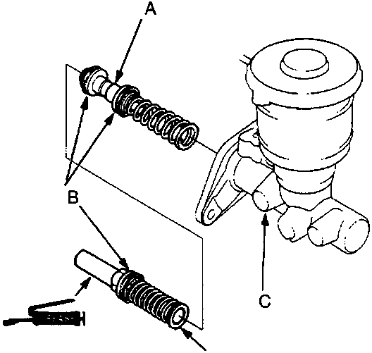 Exploded view of primary piston assembly, cups, master cylinder body, and secondary piston assembly