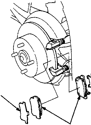 Rear brake pads, shims, and backing plate removed from caliper bracket