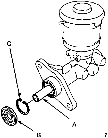 Master cylinder showing secondary piston, rod seal, and circlip removed from the assembly