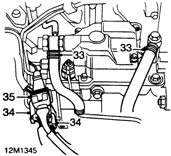 Remove 2 bolts securing slave cylinder mounting bracket to gearbox and position aside.