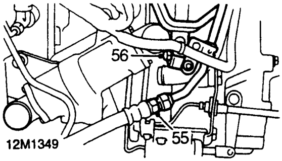 Position drain tray and cloth to absorb fluid spillage.