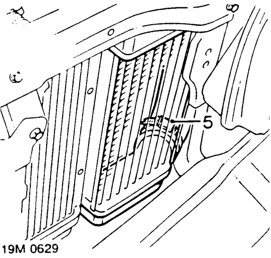 Intercooler - non air conditioning models – Slacken hose clip and release hose from top of intercooler.