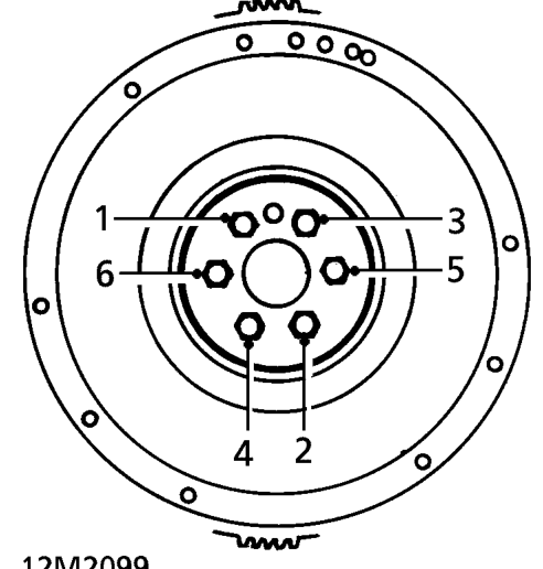 Fit flywheel to crankshaft.