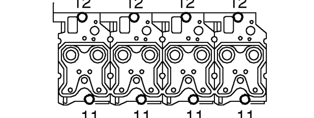 Position cylinder heads one at a time, ensuring gasket is fully covered by cylinder head.