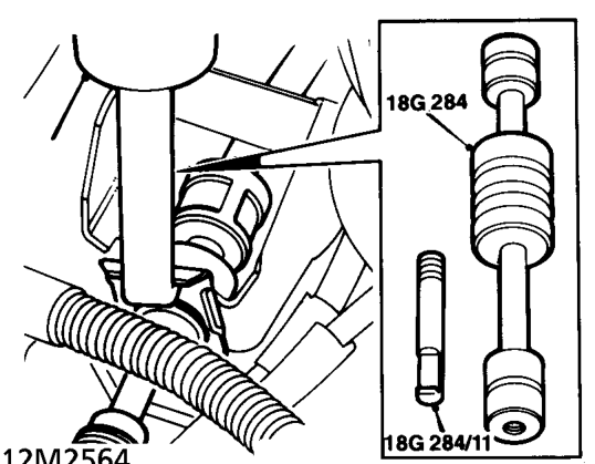 Disconnect vacuum hose from EGR valve.