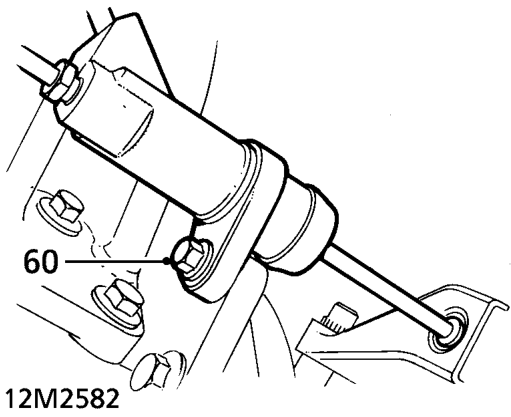 Disconnect 2 oil cooler hose unions. Remove and discard 2 ’O’ rings.