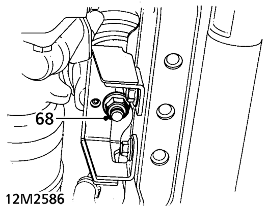 Remove 2 bolts securing front mounting to cross member.