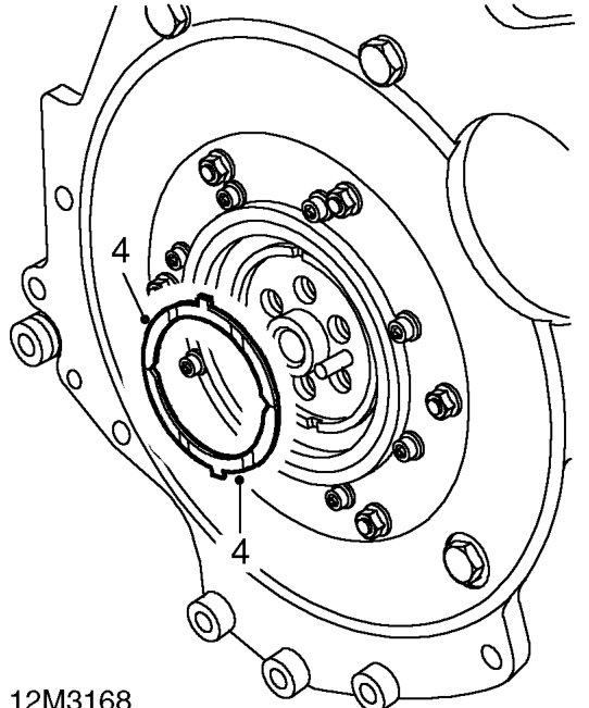 Flywheel – Remove flywheel from crankshaft.