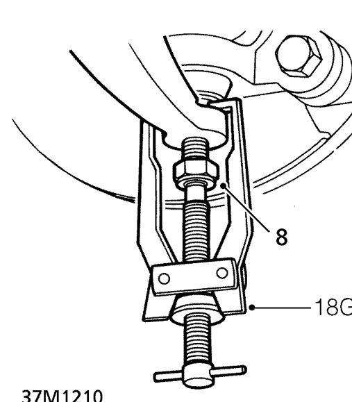 Remove nut from ball joint, break taper joint using tool 18G 1063A and release joint from 