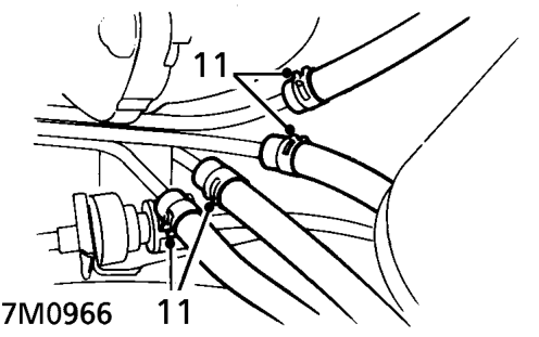 Position cloth to absorb fuel spillage.