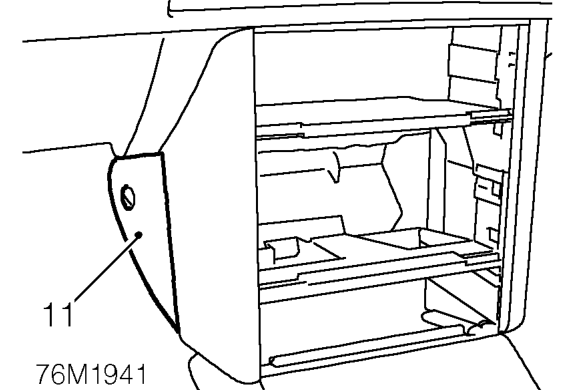 Remove 4 bolts securing glovebox and remove glovebox.