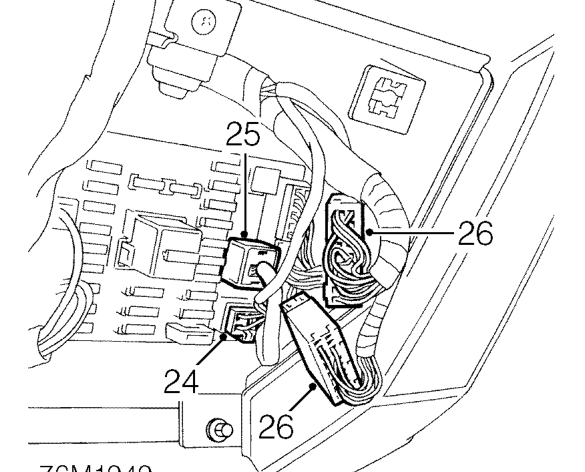 Remove bolt securing fascia behind glove box aperture.