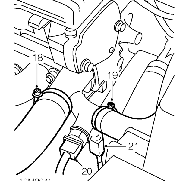 Remove and discard exhaust manifold flange gasket.