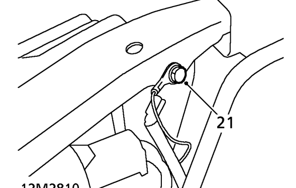 Release heater hose from clip on coolant rail and position aside.