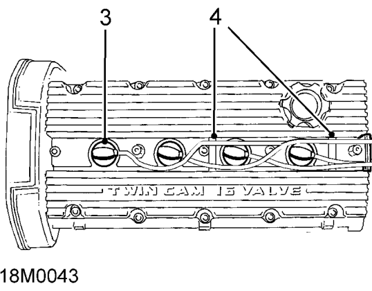 Spark plugs – Remove h.t. lead cover.