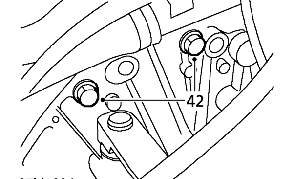 Models without air conditioning – Remove 2 bolts securing air conditioning pipe bracket to engine and gearbox.