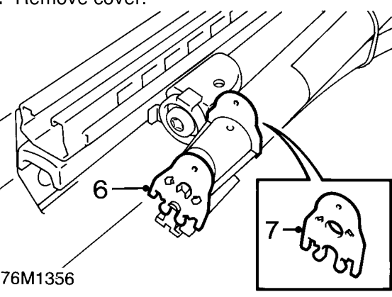 Front seat – Remove cover.