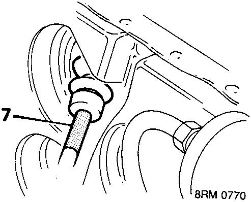 Diagram showing the speedometer cable being fed through a grommet in the bulkhead area, with callout number 7.