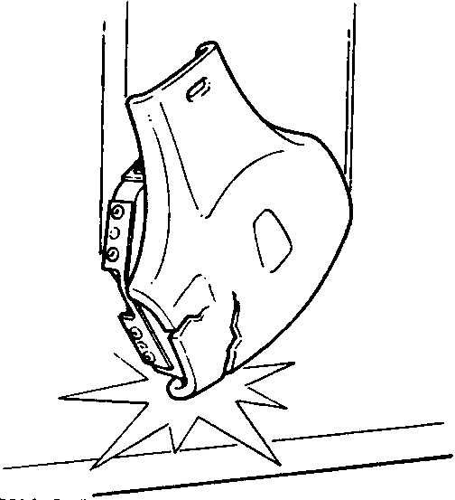 Steering wheel airbag assembly showing cracks and deformation