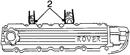 Diagram of camshaft cover with breather hoses marked as item 2