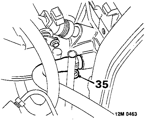 Diagram showing expansion tank hose (35) clipped to inlet manifold