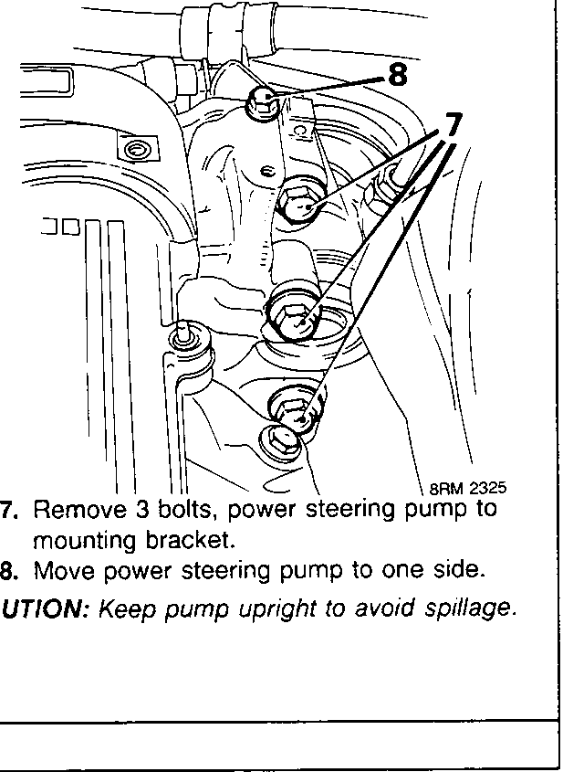 View of the power steering pump mounting area showing three bolts securing the pump to the engine block