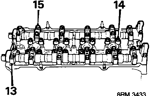 Camshaft bearing holders installed on cylinder head with bolts labeled 13, 14, 15