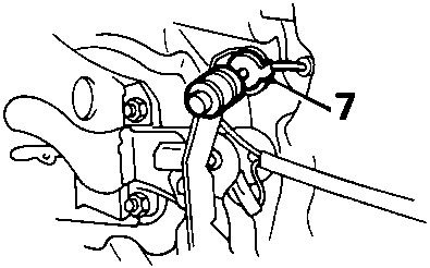 Illustrates removal of steering column shift lock cylinder