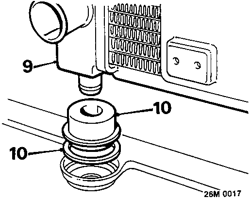 Diagram showing release of radiator from lower mountings, including mounting rubbers and seating rings