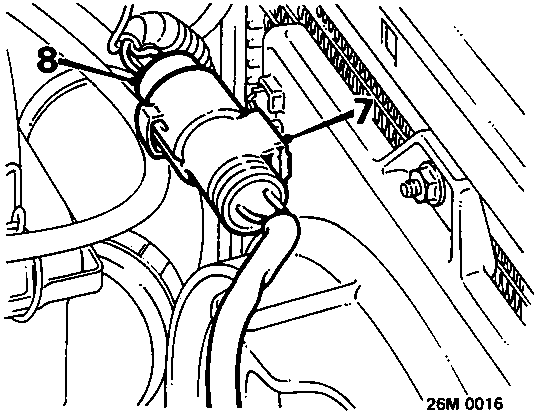 Diagram showing fan motor multiplug release from bracket
