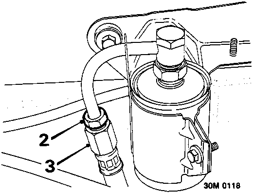 Diagram showing fuel filter union and hose connections labeled 2 and 3