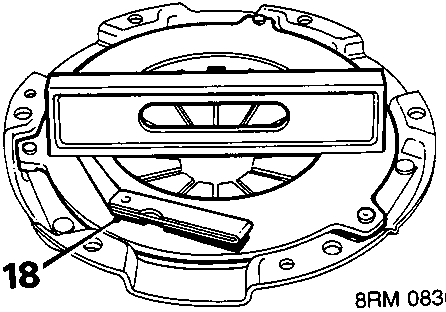 Diagram showing pressure plate with callout number 18 indicating the surface to be checked for flatness