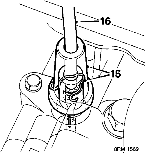 Diagram showing speedometer cable cover (16) and retaining clip (15)