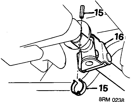 Diagram showing roll pin retaining clip and selector rod on manual transmission