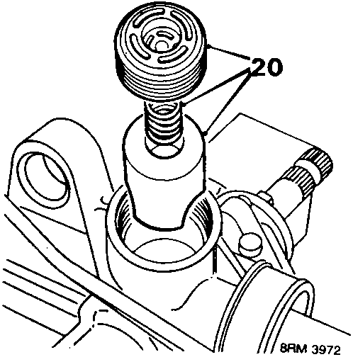Diagram showing yoke cover, spring and yoke (labeled 20) being removed from the pinion housing.